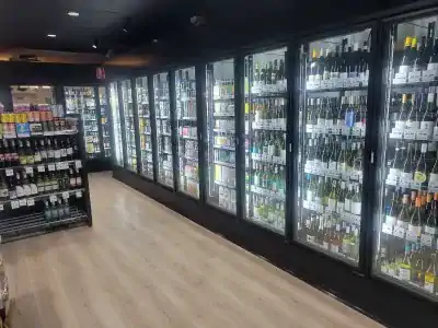Refrigerated wine display inside Bailey Bottle Shop